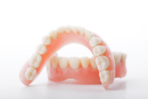 Tips To Help Keep Dentures In Place